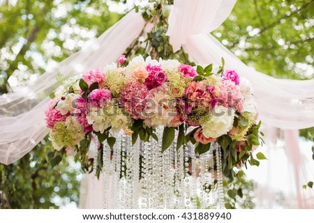 Wedding decoration ceremony (Chandelier in the arch of flowers)
