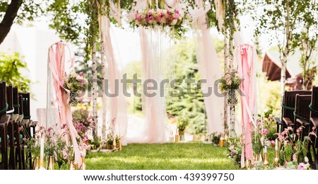 Wedding decoration (arch on the lawn in the park)