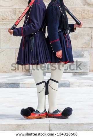 Evzones (presidential ceremonial guards) guarding the Tomb of the Unknown Soldier at the Hellenic Parliament