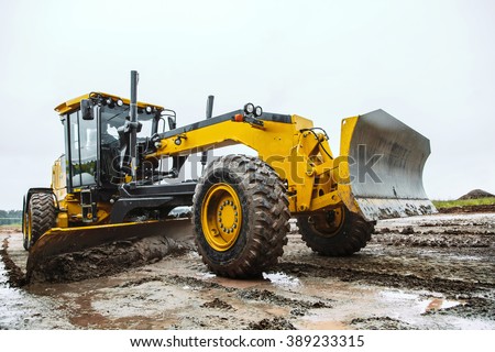 Road grader - heavy earth moving dirty