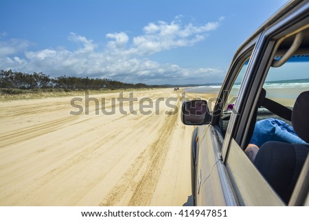 Driving on 75 Mile Beach on Fraser Island, Queensland, Australia