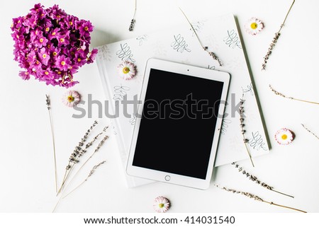 workspace. tablet, lavender, wedding photo album, bouquet of flowers on white background. top view, flat lay