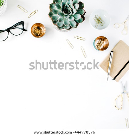 feminine desk workspace with succulent, retro camera, scissors, diary, glasses and golden clips on white background. flat lay, top view