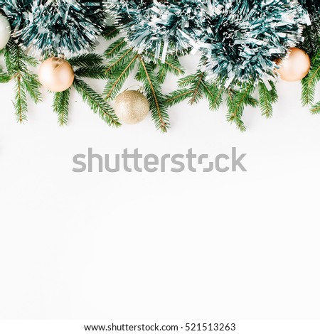Christmas composition with fir branches, pine cones, christmas balls and tinsel. Flat lay, top view