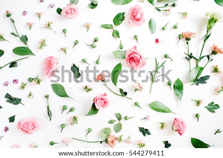 Floral pattern made of pink and beige roses, green leaves, branches on white background. Flat lay, top view. Valentine\'s background. Floral pattern. Pattern of flowers. Flowers pattern texture