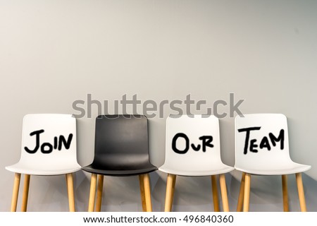 Job recruiting advertisement represented by \'JOIN OUR TEAM\' texts on the chairs. One chair is colored differently to represent the hiring position to be recruited and filled.