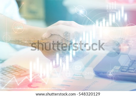 Double exposure of handshake and city night,with business document.digital diagram chart and graph