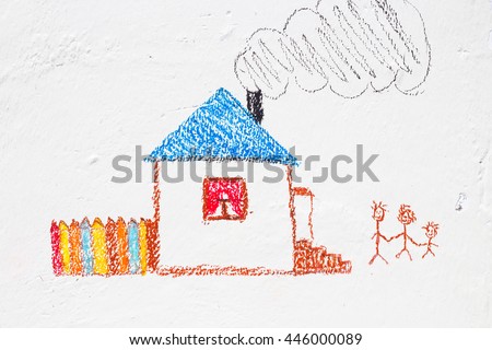 child drawing on the wall
