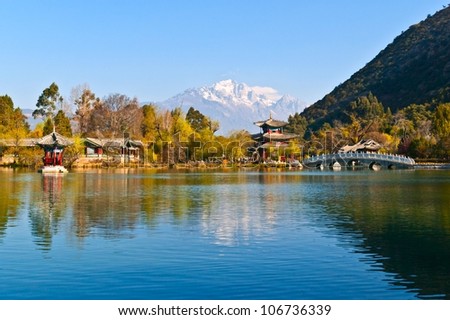 Lijiang old town scene-Black Dragon Pool Park. . In the there, you can see Jade Dragon Snow Mountain.