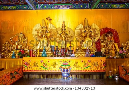 WUTAI,SHANXI/CHINA- AUG 21: Gold Buddhas on Aug 21, 2012 in Wutai, Shanxi, China. Taken in the Luohou temple. The Luohou temple is one of Mount Wutai Temples.