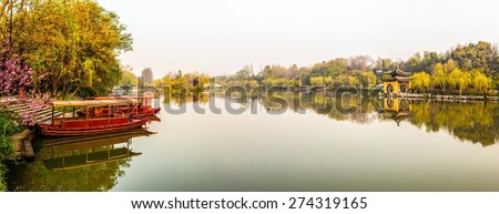 Lender west lake in morning. Slender west lake is a well-known scenic spot in China. It is situated in the northwest suburb of Yangzhou City.  It is a scenic area with many enchanting lake scenes.