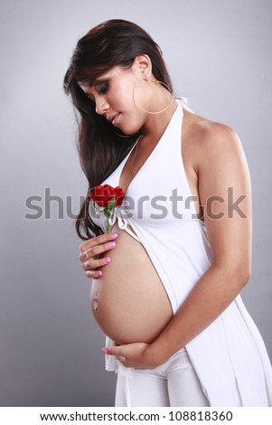 Cute mother to be and rose