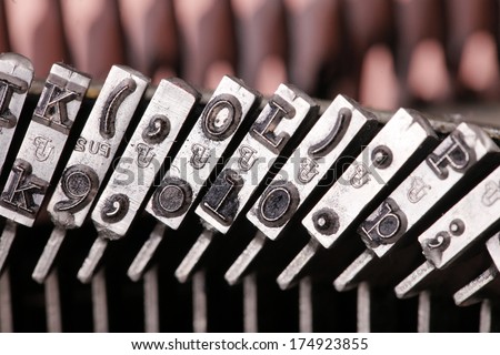 Row of vintage typewriter metal case