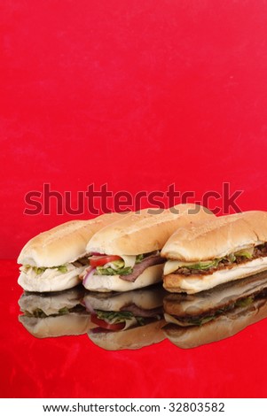 3 popular sandwiches - Chicken Caesar, Deli giant and Philly - Poster