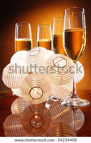 stock photo Wedding champagne with chinese lantern favors