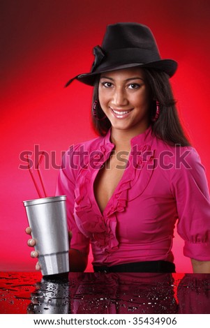 Red on red girl with silver soda cup