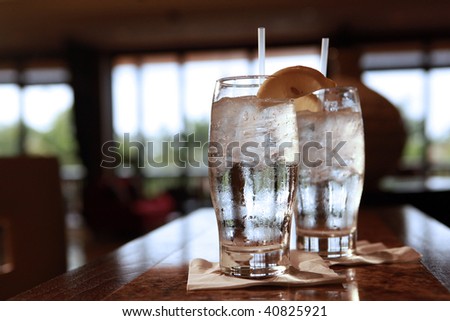 Gin and tonic or plain cold water on the counter