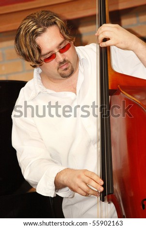 MIAMI BEACH, FLORIDA - JUNE 20: Jazz bass player Jamie Ousley performs onstage at hiss Latest CD release at Bath Club, June 20, 2010 in Miami Beach