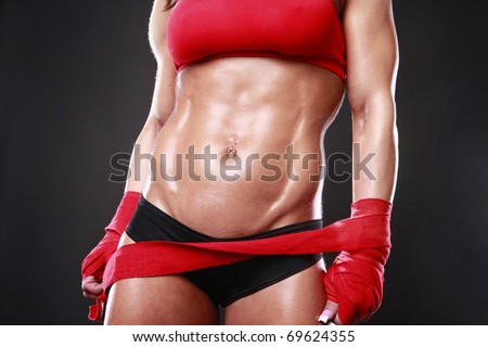 Body builder with boxing wraps