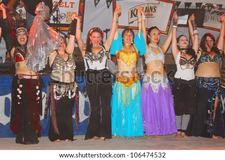 TULSA, OK - OCT 20: Dancers pose after their number at Oktoberfest in TULSA, OK, on October 20, 2011 in TULSA, OK. Tulsa is the origin of the first Oktoberfest Chicken Dance in the United States.
