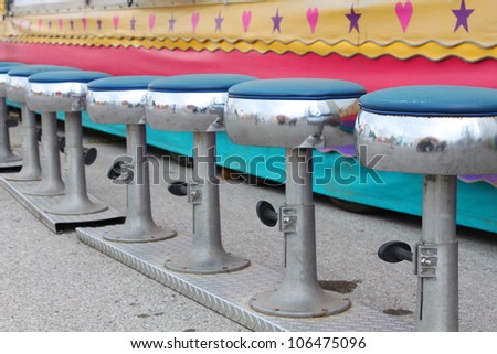Bar stools at a fair game