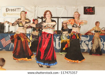 TULSA, OK - OCT 20: Members of Gypsy Fire Belly Dancers group perform at Oktoberfest in TULSA, OK, on October 20, 2012 in TULSA, OK.