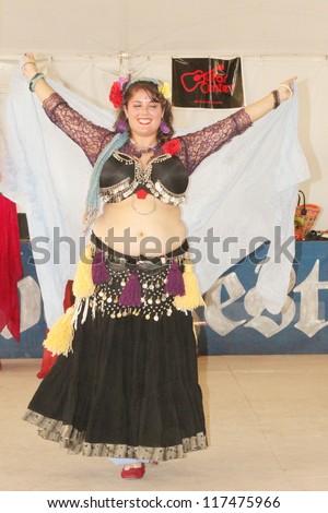 TULSA, OK - OCT 20: Gypsy Fire Belly Dancers group perform at Oktoberfest in TULSA, OK, on October 20, 2012 in TULSA, OK. Tulsa is the original place of Chicken Dance performed at Oktoberfest.