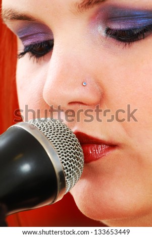 Young woman sings