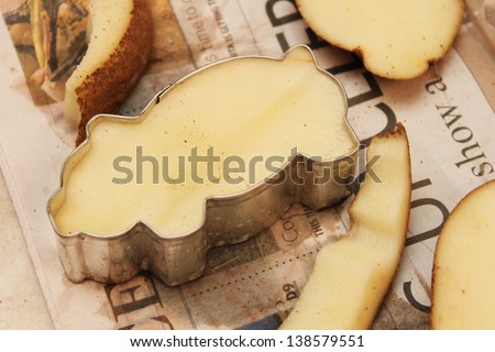 Pig stamp cut out from potato
