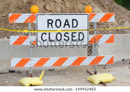 Road closed sign on a road