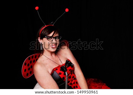 Woman dressed as a lady bug