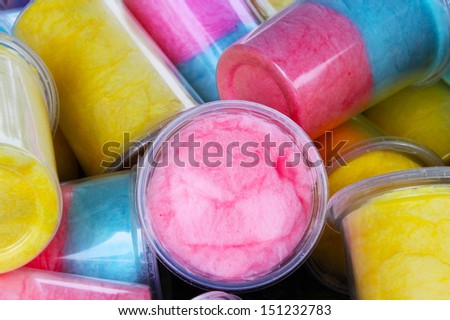 Colorful cotton candy in plastic cups