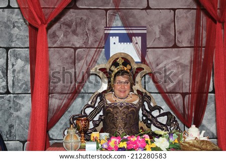 MUSKOGEE, OK - MAY 24: Queen greets her guests at the Queen\'s Tea party at the Oklahoma 19th annual Renaissance Festival on May 24, 2014 at the Castle of Muskogee in Muskogee, OK