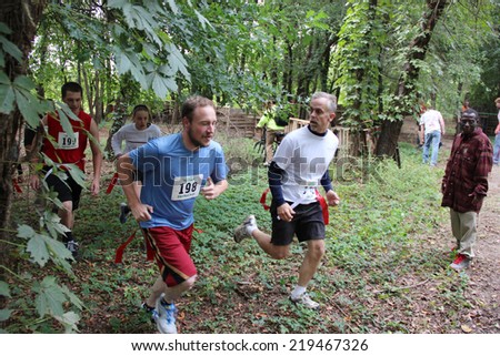 MUSKOGEE, OK - Sept. 13: Runners start at a difficult zombie-infested course during the Castle Zombie Run at the Castle of Muskogee in Muskogee, OK on September 13, 2014.