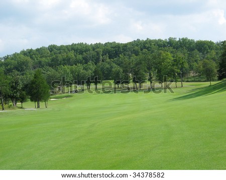 Green golf course with space for text