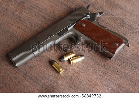 Gun and bullets on a table