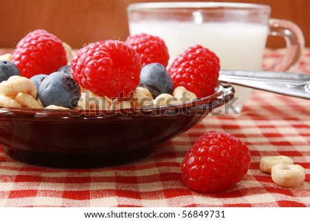Cereal with berries and milk