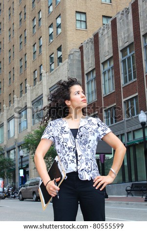 Powerful businesswoman on a street of a city