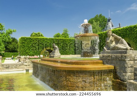 Fountain in the park of roses. Germany, Baden-Baden.