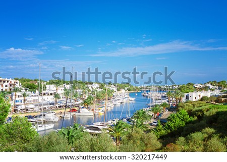 Panoramic view of the Cala D\'Or yacht marina harbor with recreational boats. Mallorca, Spain