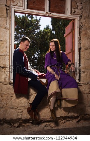 Couple in a medieval suit in a Agia Napa Medieval Monastery