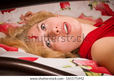 Crime scene simulation: innocence victim lying on the bed