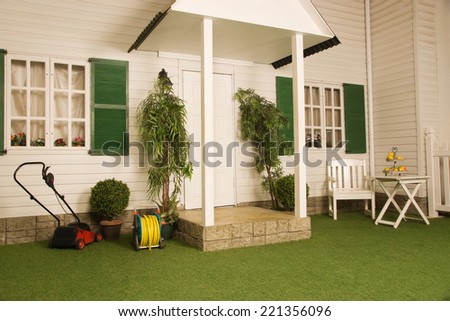 lawn in front of a country house in american style