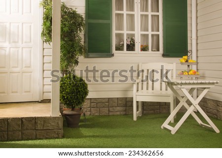 lawn in front of a country house in american style