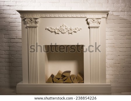 Luxurious vintage interior with decorative fireplace in the aristocratic style