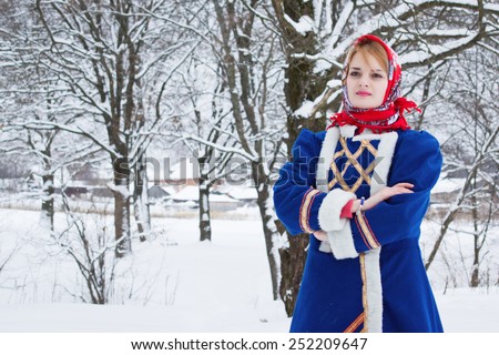 http://image.shutterstock.com/display_pic_with_logo/398806/252209647/stock-photo-russian-beauty-woman-in-traditional-clothes-against-winter-landscape-252209647.jpg