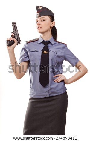 Woman police officer with gun