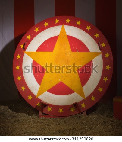 Circular disc with star in a retro circus