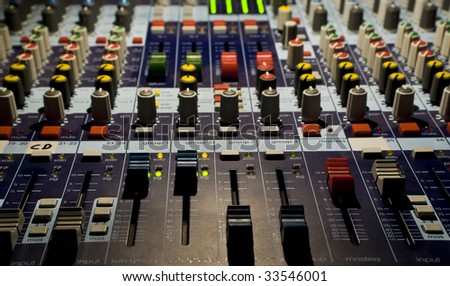 Sound producer mixer. Faders of channels and regulators. Close-up