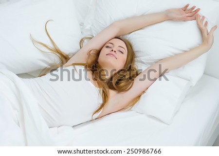 lonely woman in bed  overhead view of sleeping beauty